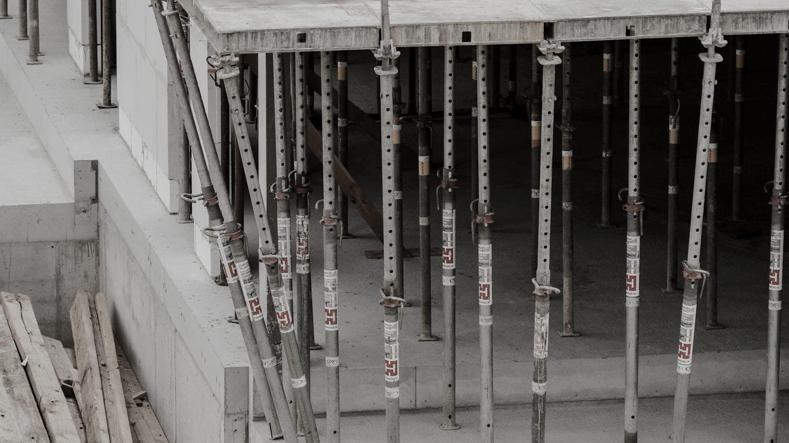 Steel props holding up formwork for a concrete slab
