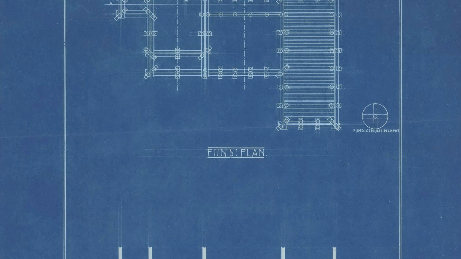 Blueprint of a foundation plan on blue drawing paper