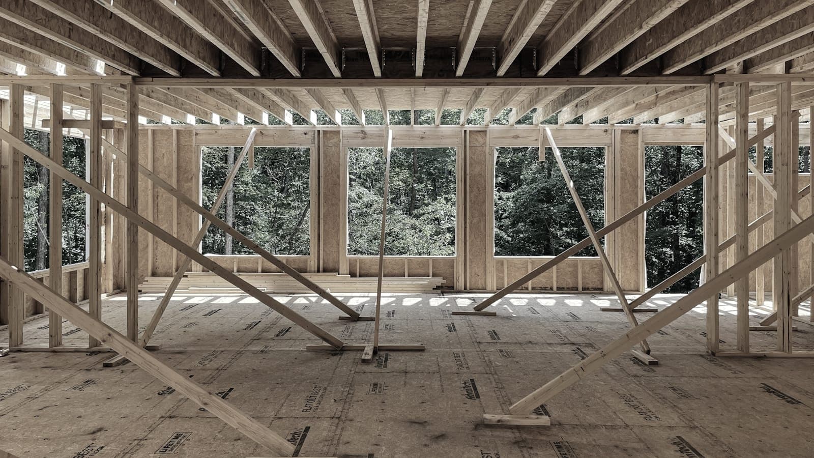 Timber floor deck and stud frame of a house under construction